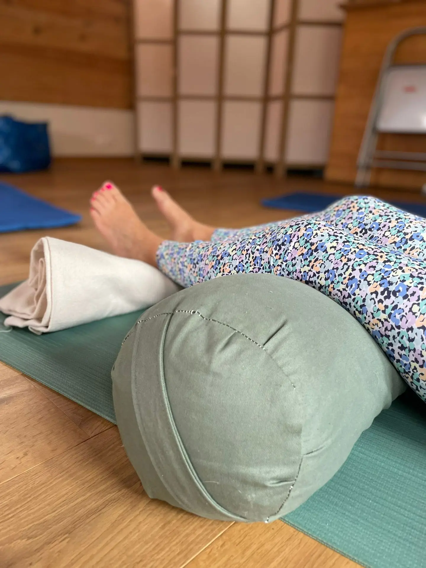 Photo pratiquant Restorative Yoga